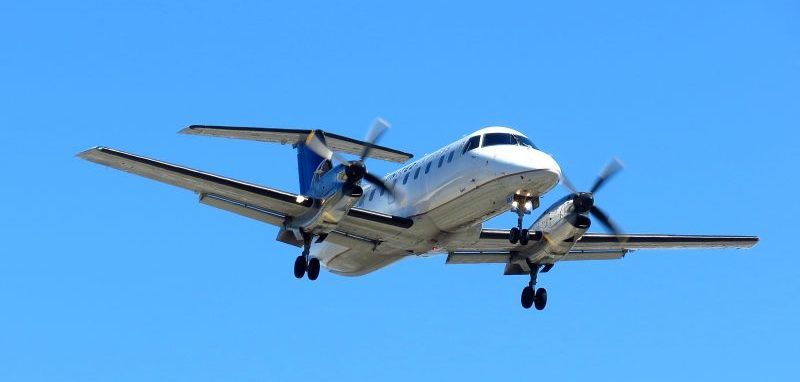 Small propeller airplane in flight